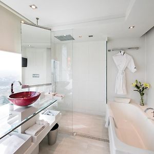 Deluxe room Cityscape view King bed Late check-out by 1300 hours Early check by 1400 hours on F&B